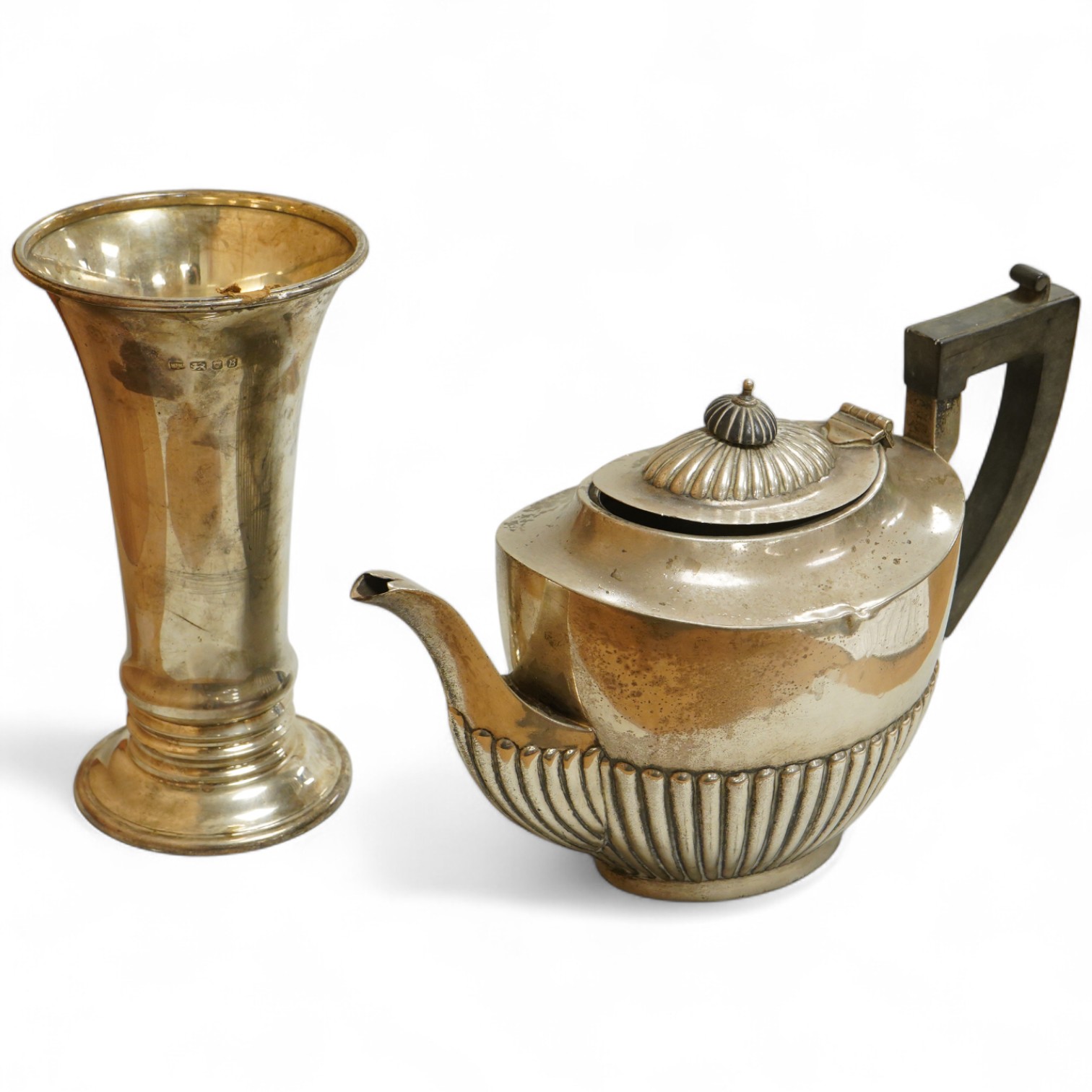 A George V demi-fluted silver oval teapot, Birmingham, 1918 and a 1970's silver vase by Mappin & Webb, gross weight 30.3oz.